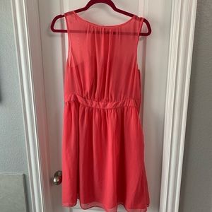 Coral chiffon dress. Perfect bridesmaid or wedding guest.